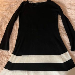 Medium length dress. Great with tights and boots at winter time.